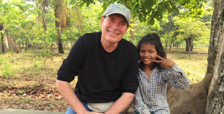"Dr. Connell with Cambodian student"
